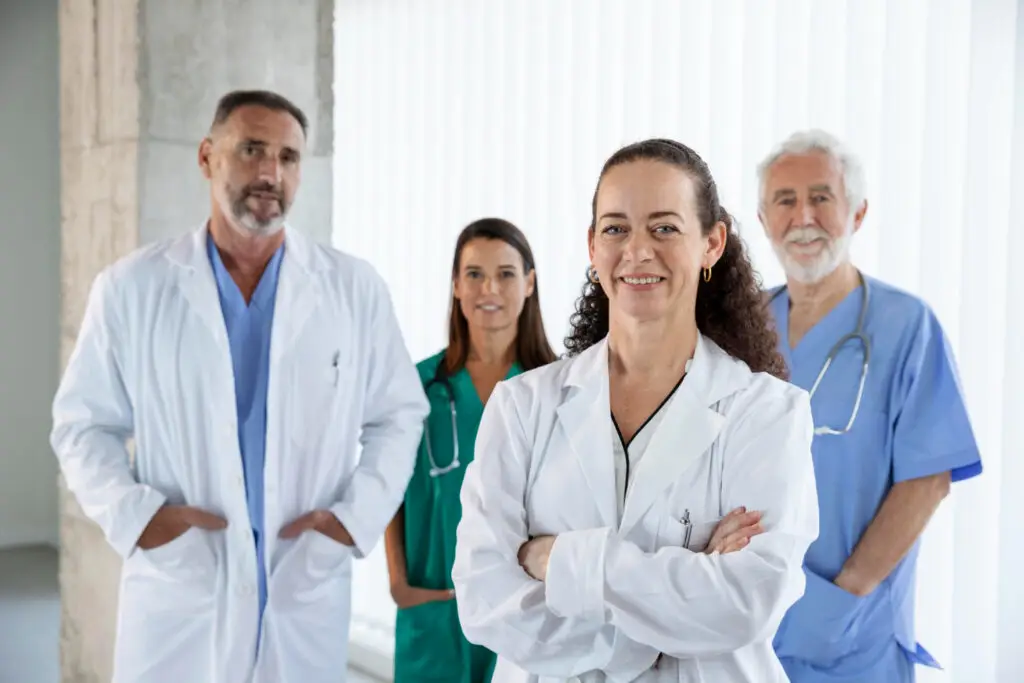 4 healthcare professionals in a room