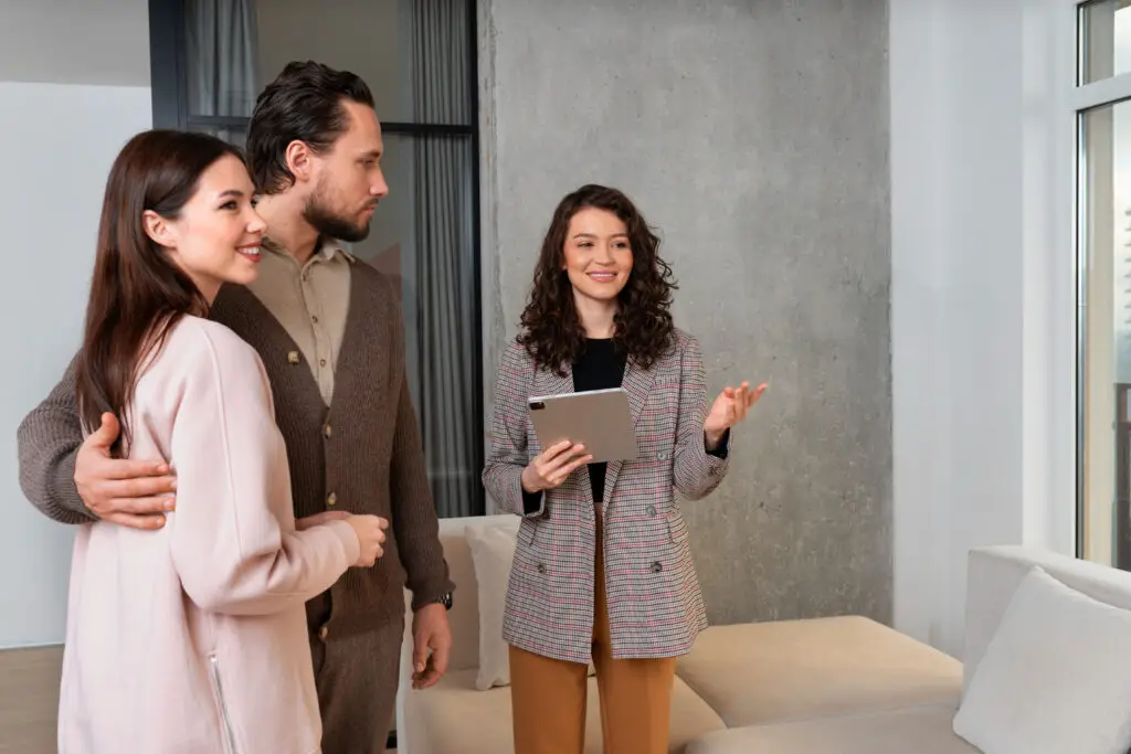 Medium shot real estate agent showing hous